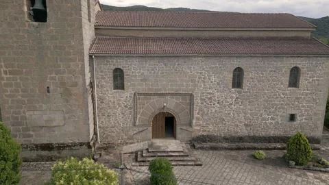 Drone flight visualizing the entrance façade to the 16th century church of Stock Footage 280645776