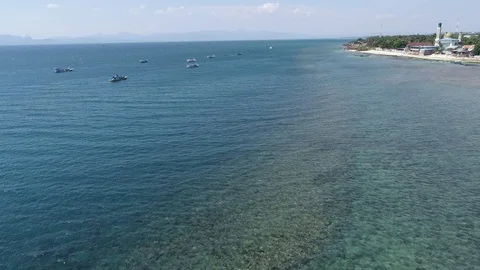 Drone flover of clear blue water and indonesian fishing boats Vídeo Stock 89869841