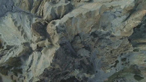 Drone fly above harsh sharp cliff peaks, Himalayas slopes in mist, Nepal Stock Footage 124681800