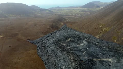 Drone fly above solidified lava in the valley of an active volcano in Iceland Stock Footage 311799677