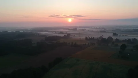 Drone fly above Summer time sunrise and mist in farmland Stock Footage 93271807