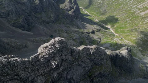 Drone fly along Tower Ridge on Ben Nevis revealing the route Stock Footage 330591757