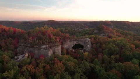 Drone Fly Up and Over Epic Natural Bridge Stone Formation Sunset Stock Footage 256172048