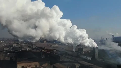 Drone fly around toxic enterprise chimneys tubing against the sky background Stock Footage 149352024