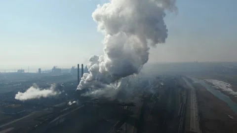 Drone fly around toxic enterprise chimneys tubing against the sky background Stock Footage 149352194