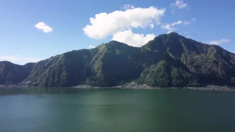 Drone fly around volcano and lake Bali Indonesia Stock Footage 161783363