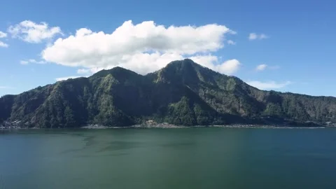 Drone fly around volcano and lake Bali Indonesia Stock Footage 162568643