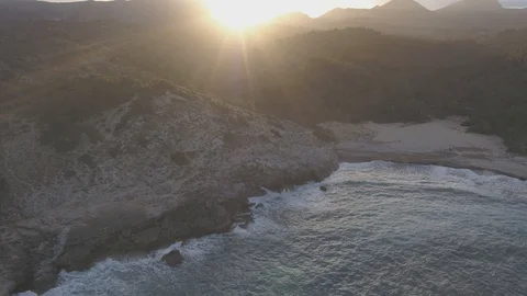 Drone fly away from empty beach during sunset Stock Footage 100265252