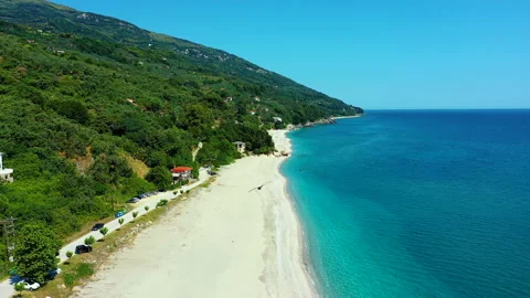 Drone fly backwards Horefto beach Greece 4K 2 Video stock 156774890