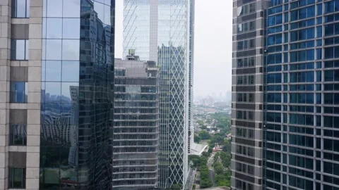 Drone Fly Between Two Buildings. Jakarta - Indonesia Stock Footage 130541149