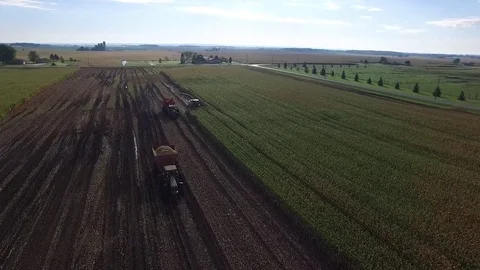 Drone fly by of corn harvester Stock Footage 82537837