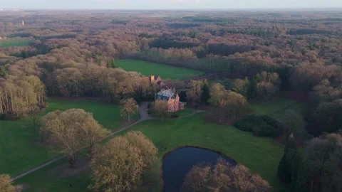 Drone Fly Forward Toward Castle in Bulskampveld Forest, Belgium | FlyLens Stockbeeldmateriaal 328238749