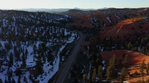 Drone Fly Up High Bryce Canyon Utah Sunset Snow Wild Forest Tree Mountain Stock Footage 186942825
