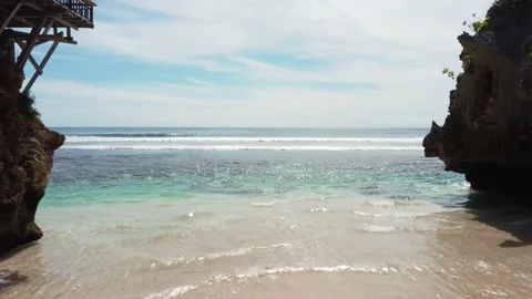 Drone fly out from cave to ocean Stock Footage 154225212