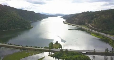 Drone fly over beautiful still Lake Coeur d'Alene in northern Idaho Stock Footage 284168886