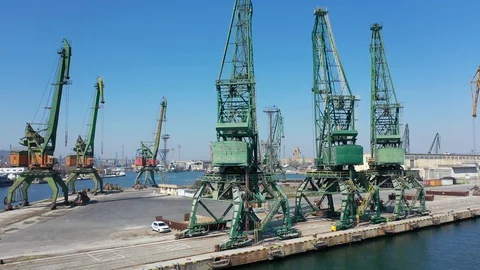 Drone fly over inactive cranes in closed COVID-19 port. Port structure 4K Stock Footage 128398180