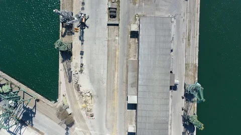 Drone fly over inactive cranes in closed COVID-19 port. Port structure 4K Stock Footage 128398201