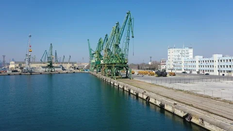 Drone fly over inactive cranes in closed COVID-19 port. Port structure 4K Stock Footage 128398210