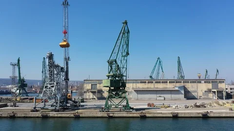 Drone fly over inactive cranes in closed COVID-19 port. Port structure 4K Stock Footage 128398229