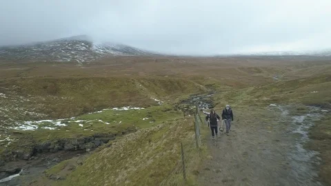 Drone Fly Over a Large Pot Hole with Ingleborough in the distance Video stock 88961430