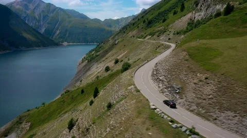 Drone fly over the mountains, river and waterfalls of French Alps, France. Video stock 130912482