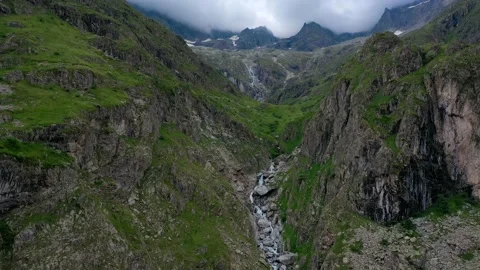 Drone fly over the mountains, river and waterfalls of French Alps, France. Stock Footage 130912604