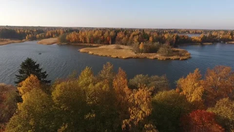 Drone fly over a narrow strait of sea in autumn Stock Footage 165470291