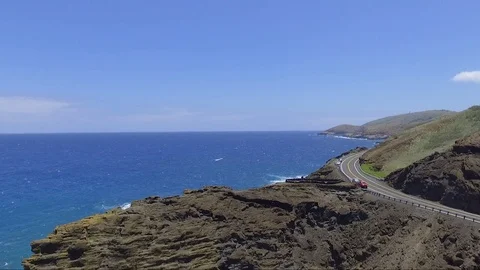 Drone Fly Over Ocean Rocky Cliffs And Highway 動画素材 78554953