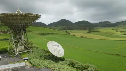 Drone fly over parabolic antenna radio station on cloudy day in Sao Miguel Vídeos de archivo 263299072