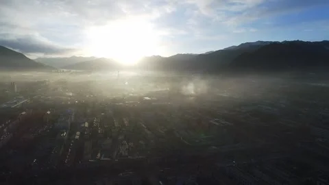 Drone Fly-Over of Potala Palace at Sunrise Revealing Lhasa, Tibet China Stock Footage 337014863
