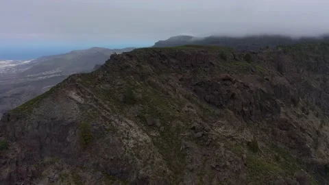 Drone fly over Risco Faneque, Agaete, Gran Canaria, Las Palmas Province Spain Stock Footage 130913554