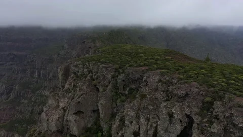Drone fly over Risco Faneque, Agaete, Gran Canaria, Las Palmas Province Spain Stock Footage 130913575
