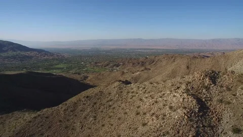 Drone fly over rocky  Desert Mountain Valley Stock Footage 147459750