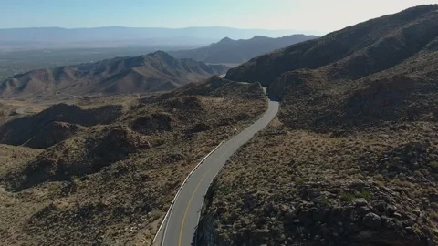 Drone fly over rocky  Desert Mountain Road with cars 스톡 동영상 148508945