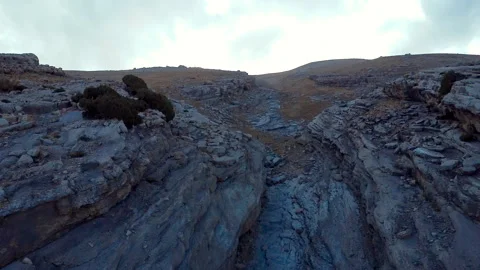 Drone fly over rocky dry Hojja Gur Gur Ota or Khodja Gur Gur Ota mountain range Stock Footage 292544968