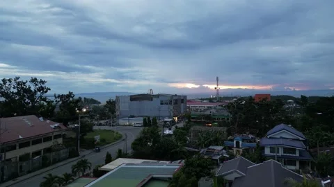 Drone fly over a small peaceful town center at dusk in the Philippines. Stock Footage 214144483