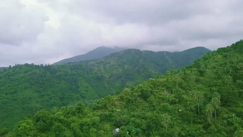 Drone fly over tropical mountains covered with forest and lush greenery. Stock Footage 137444547