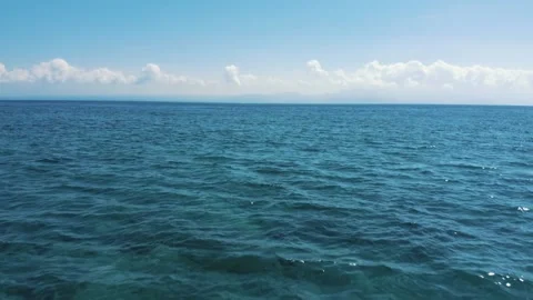 Drone fly over water in ocean in slowmotion Stock Footage 165976599
