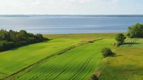 Drone fly slowly over Danish countryside 4K Stock Footage 237375113