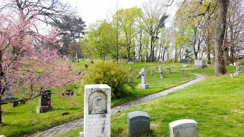 Drone fly through graveyard monument Greenwood Cemetery Stock Footage 129276338