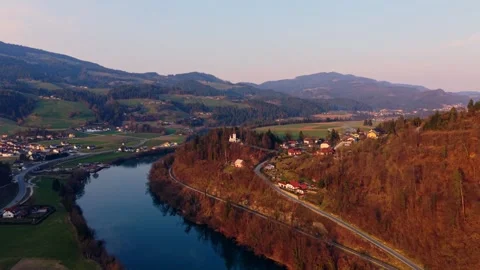 Drone fly toward river valley village Stock Footage 330544611