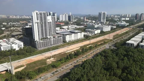 Drone fly towards 3rd Avenue in Cyberjaya Stock Footage 149380356