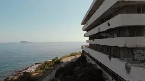 Drone fly by of war torn abandoned hotel in Croatia Stock Footage