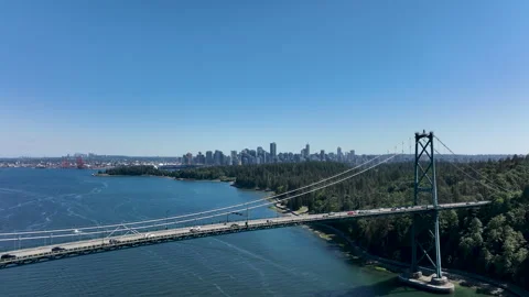 Drone Flyaway from Lions Gate Bridge Toward Downtown Vancouver Skyline, Bri.. Stock Footage 329818491