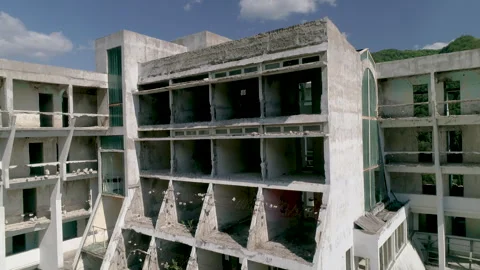 Drone Flyby of Abandoned Hotel Facade in Mountains Stock Footage 340358546