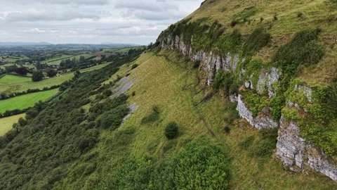 Drone flyby of Keshcorran caves on Limestone Cliffs, County Sligo, Ireland Stock Footage 341523289