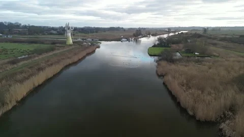Drone flyby of Thurne windmill on the Norfolk Broads Stock Footage 231341500