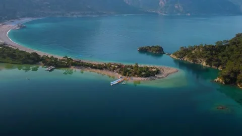 Drone flying above the beautiful peninsula of Oludeniz beach. Stock Footage 196984904