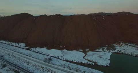 Drone flying above big sandpit with working machinery industrial rural landscape Stock Footage 102095370