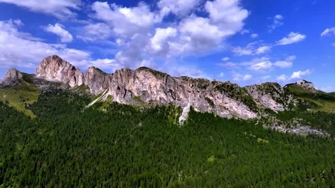 Drone flying above the dolomites during a sunny day 스톡 동영상 263267698